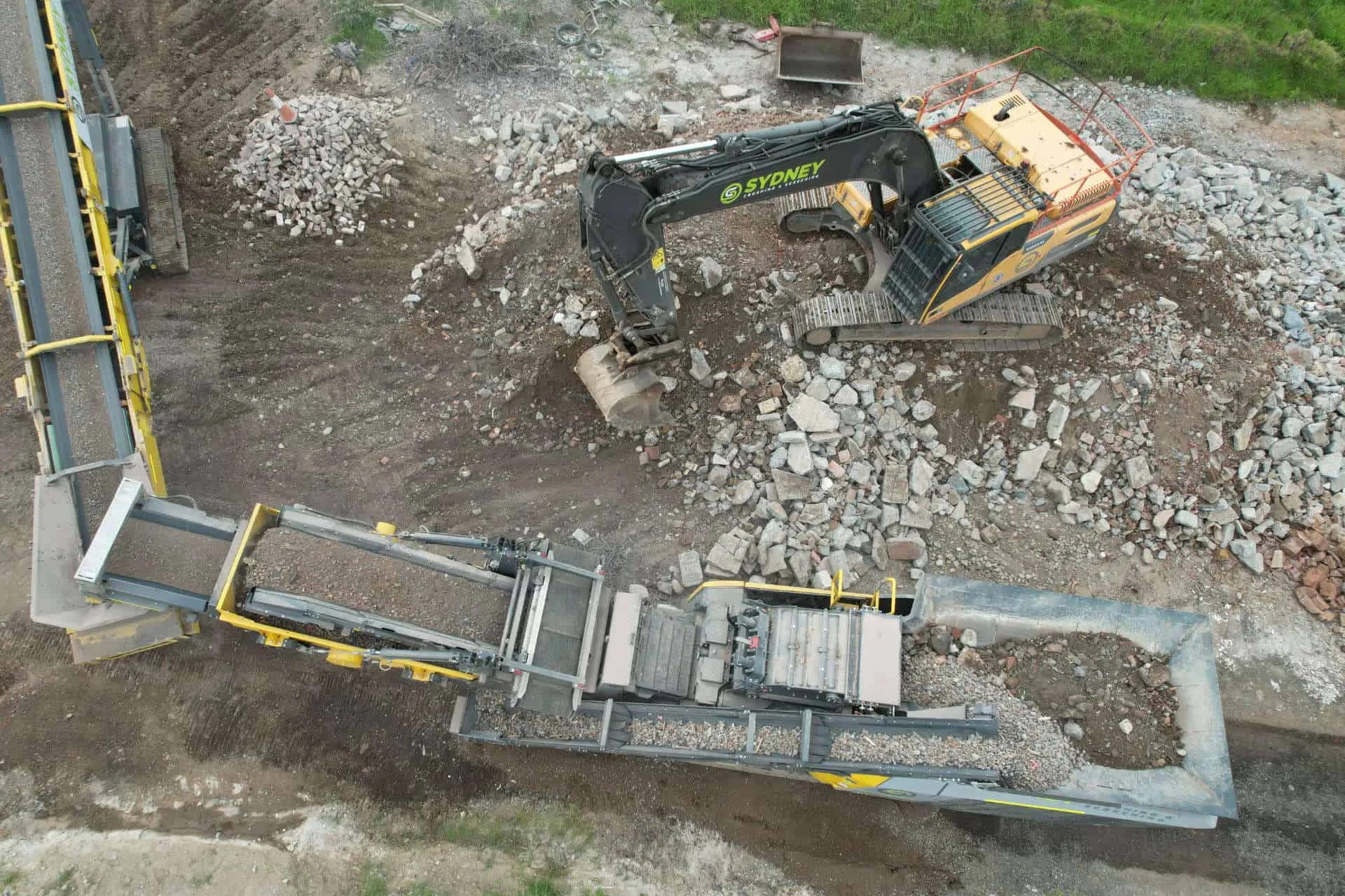 Mobile jaw crusher processing concrete on a Sydney work site