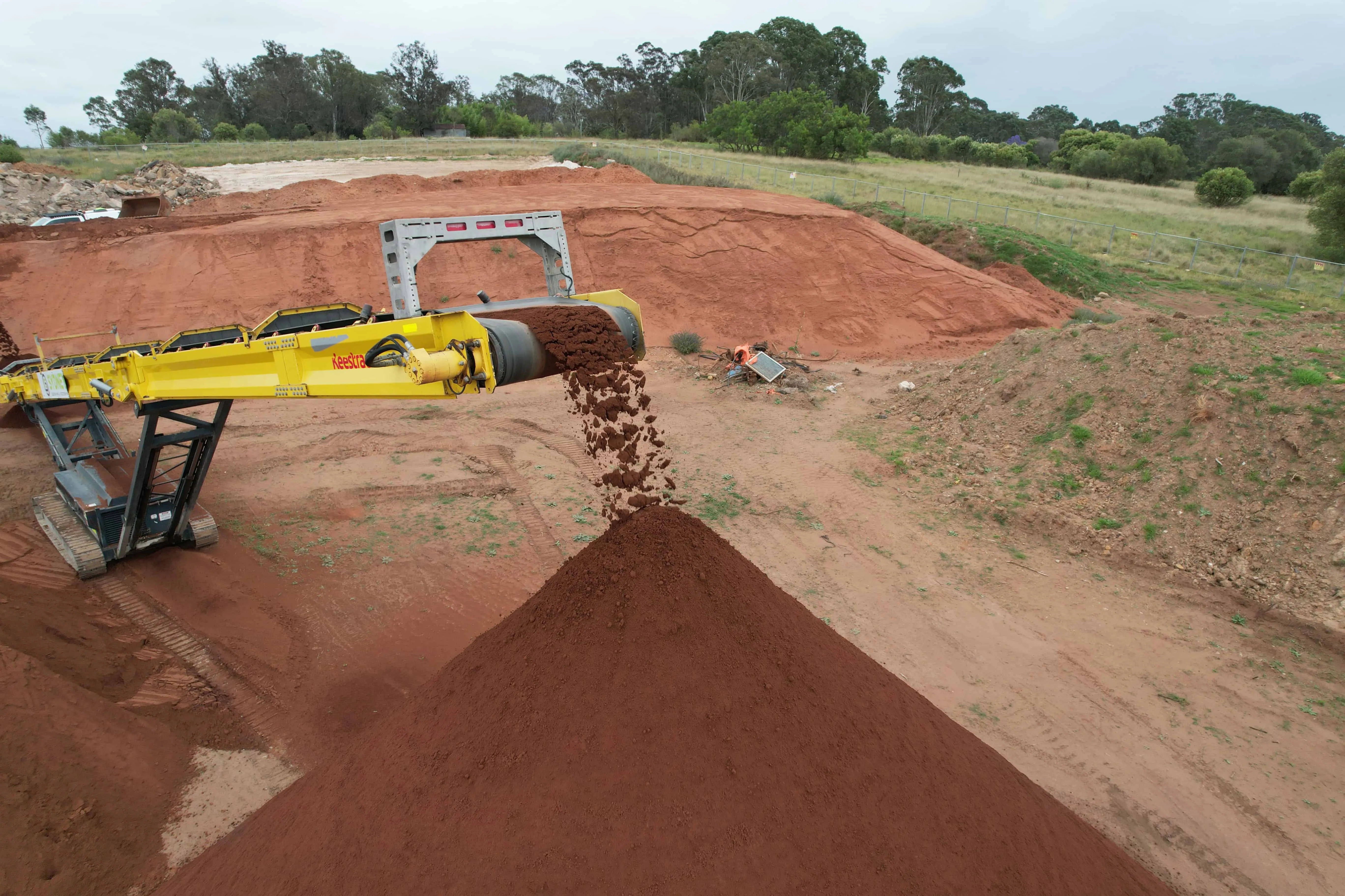 Aerial view of a conveyor stacking screened material